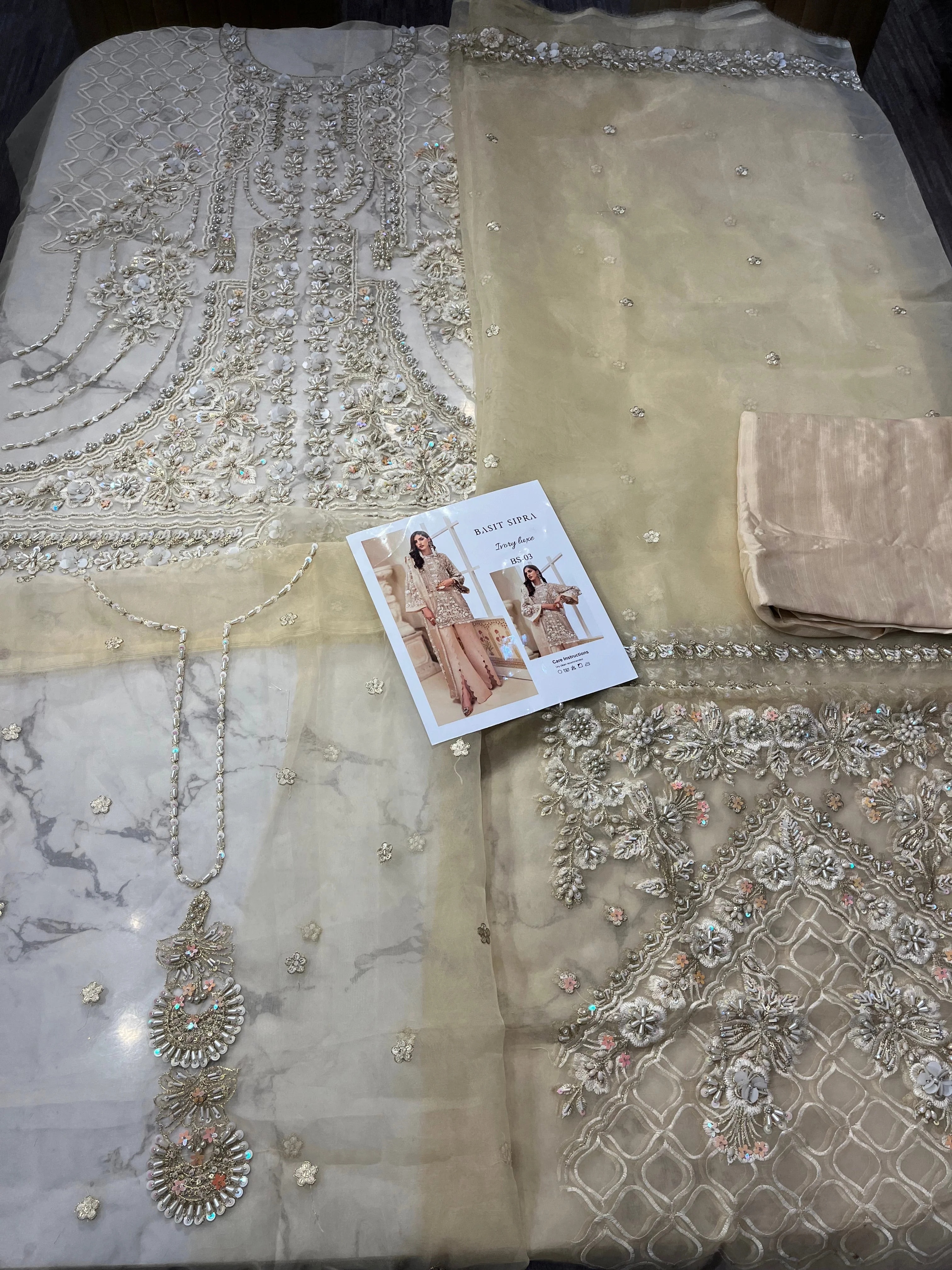 Ivory Luxe pakistani fashion outfit in ivory, beige, gold tones.